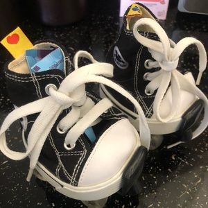 Black and white converse shoes w skates